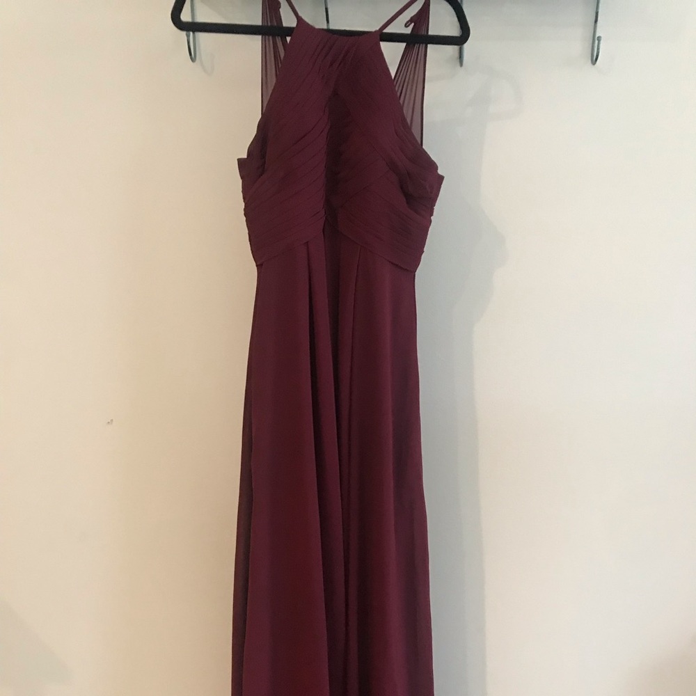Long burgundy halter dress.